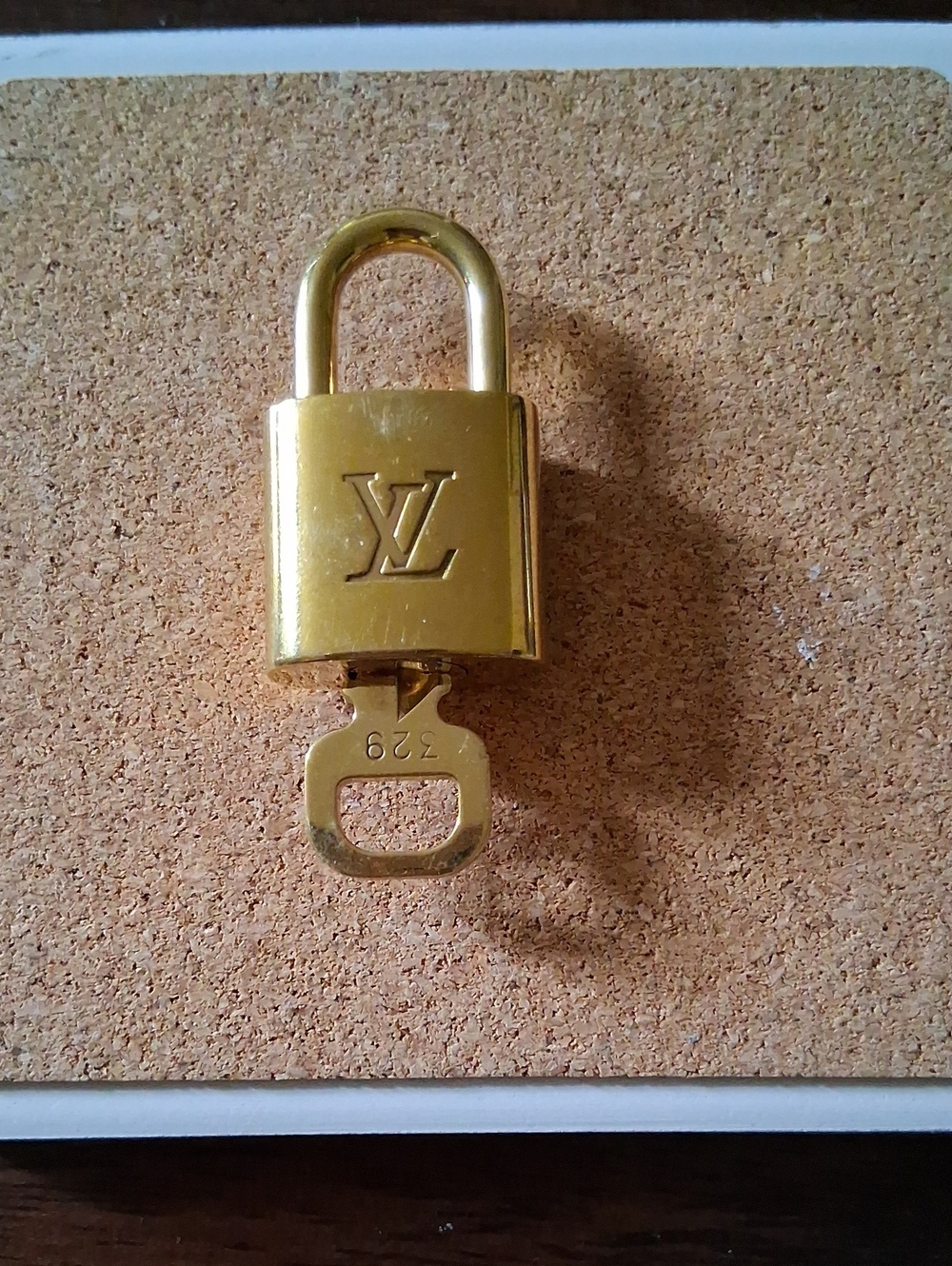 Louis Vuitton Gold Padlock and Key Set Shiny And NEW